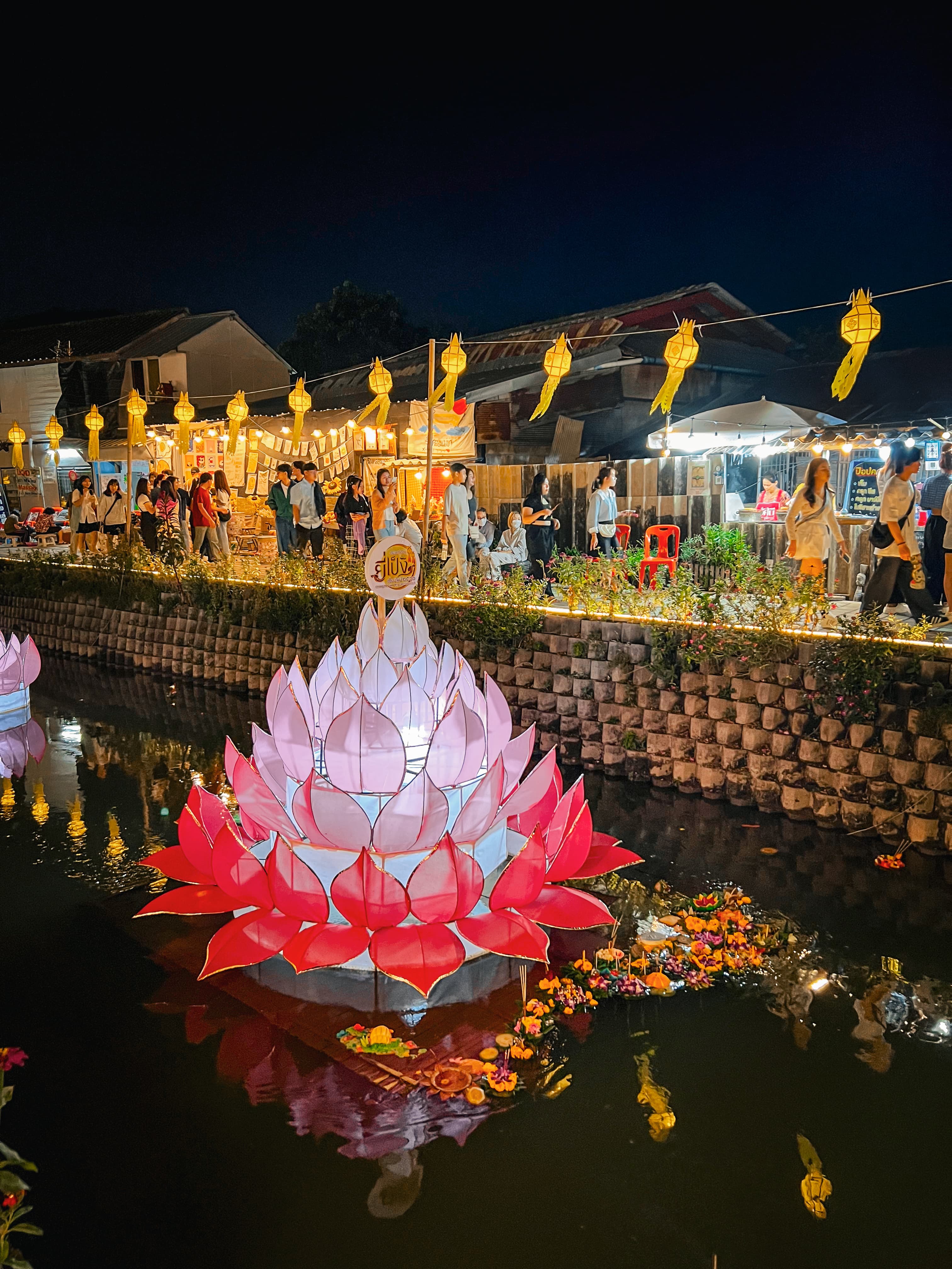 Loy Krathong festival on the Ping River at night, Chiang Mai
